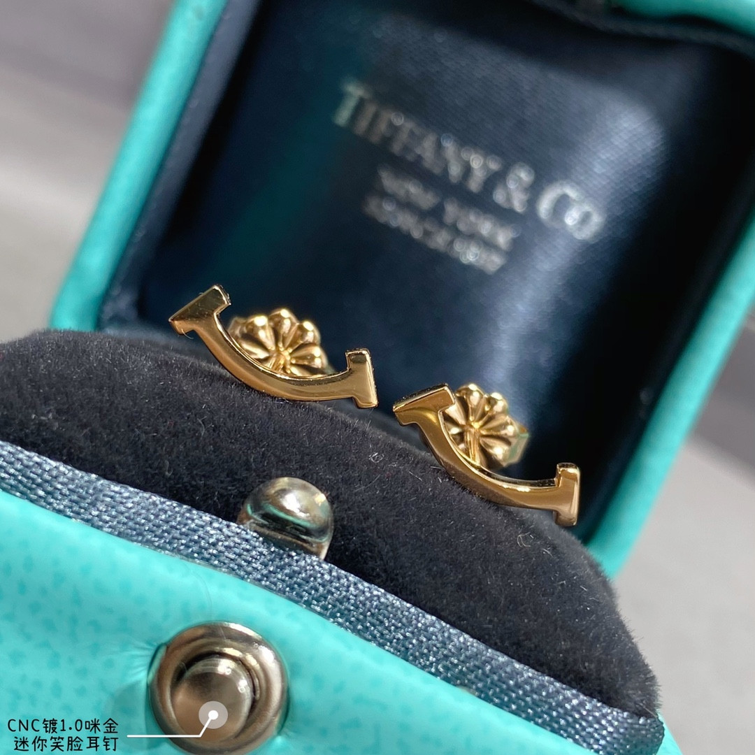 Tiffany & Co. Mini Smile Smooth Stud Earrings