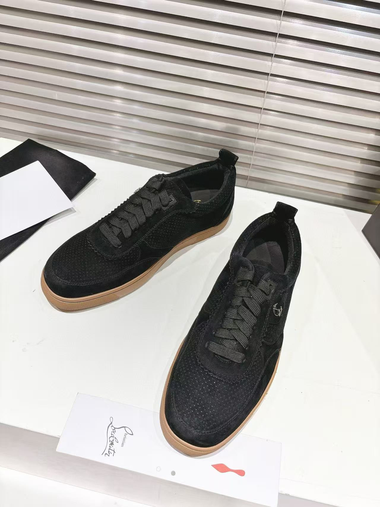 UA Christian Louboutin Sneaker