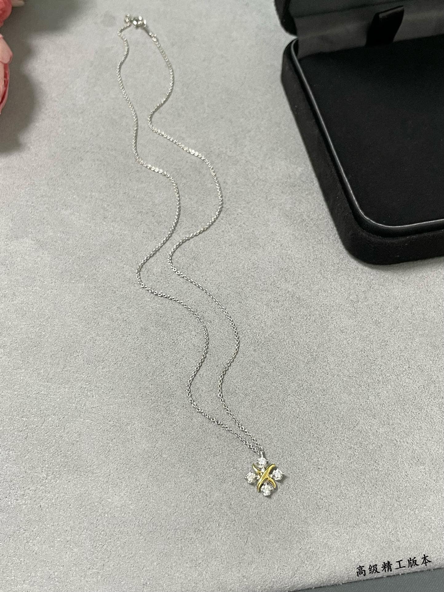 Tiffany & Co. Crossed Double Tone Necklace