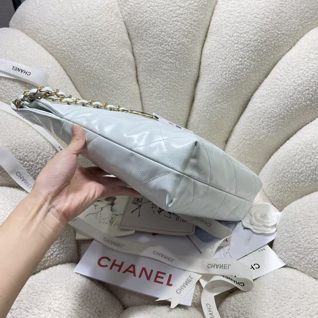 CHANEL 22 SMALL HANDBAG Shiny Calfskin Light Blue 37X35X7cm