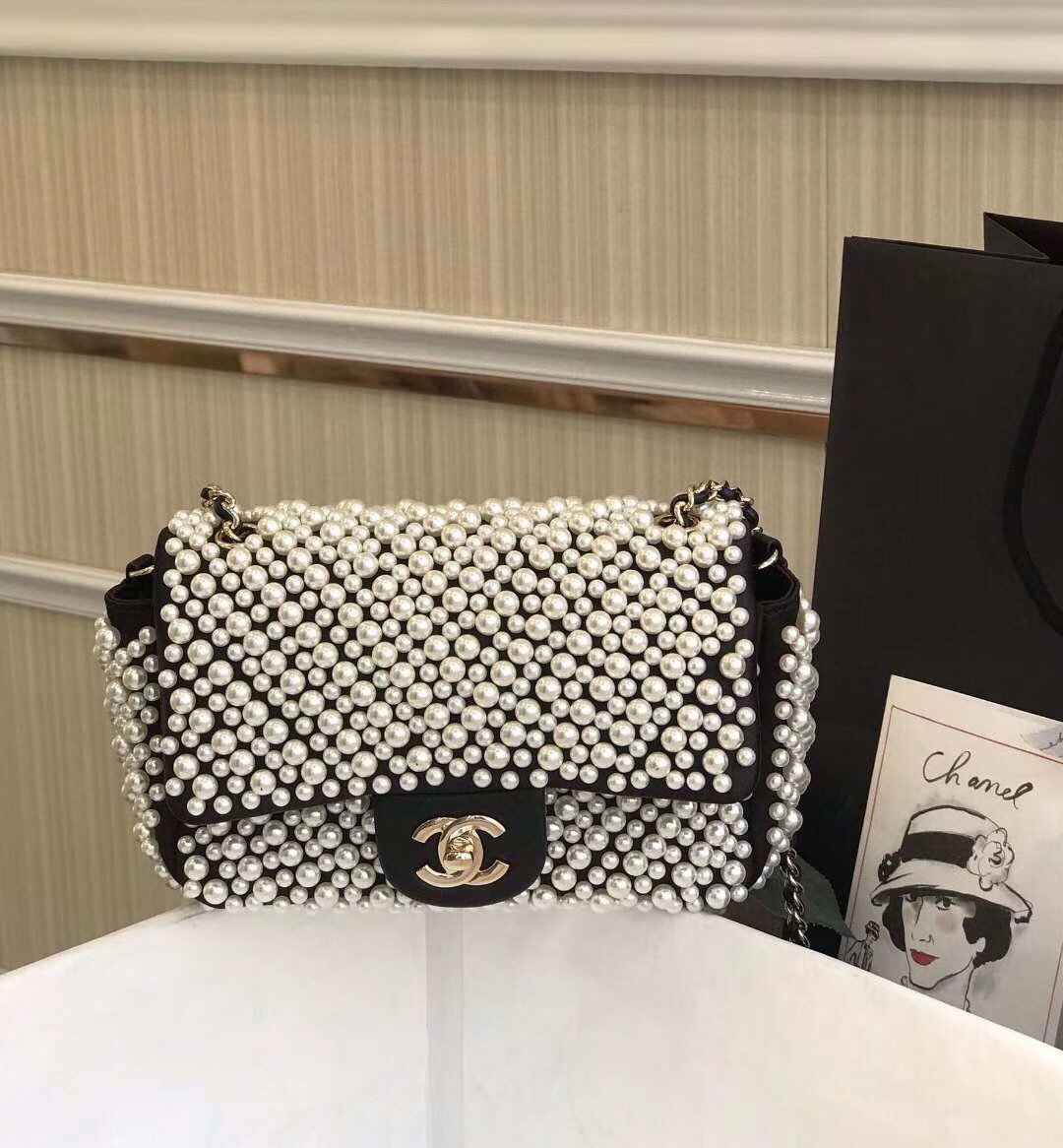 Chanel pearl on flap bag 5.9
