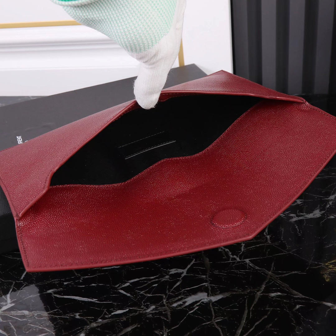 YSL UPTOWN POUCH IN GRAIN DE POUDRE EMBOSSED LEATHER ROUGE OPYUM 10.6 X 6.2 X 0.7 INCHES