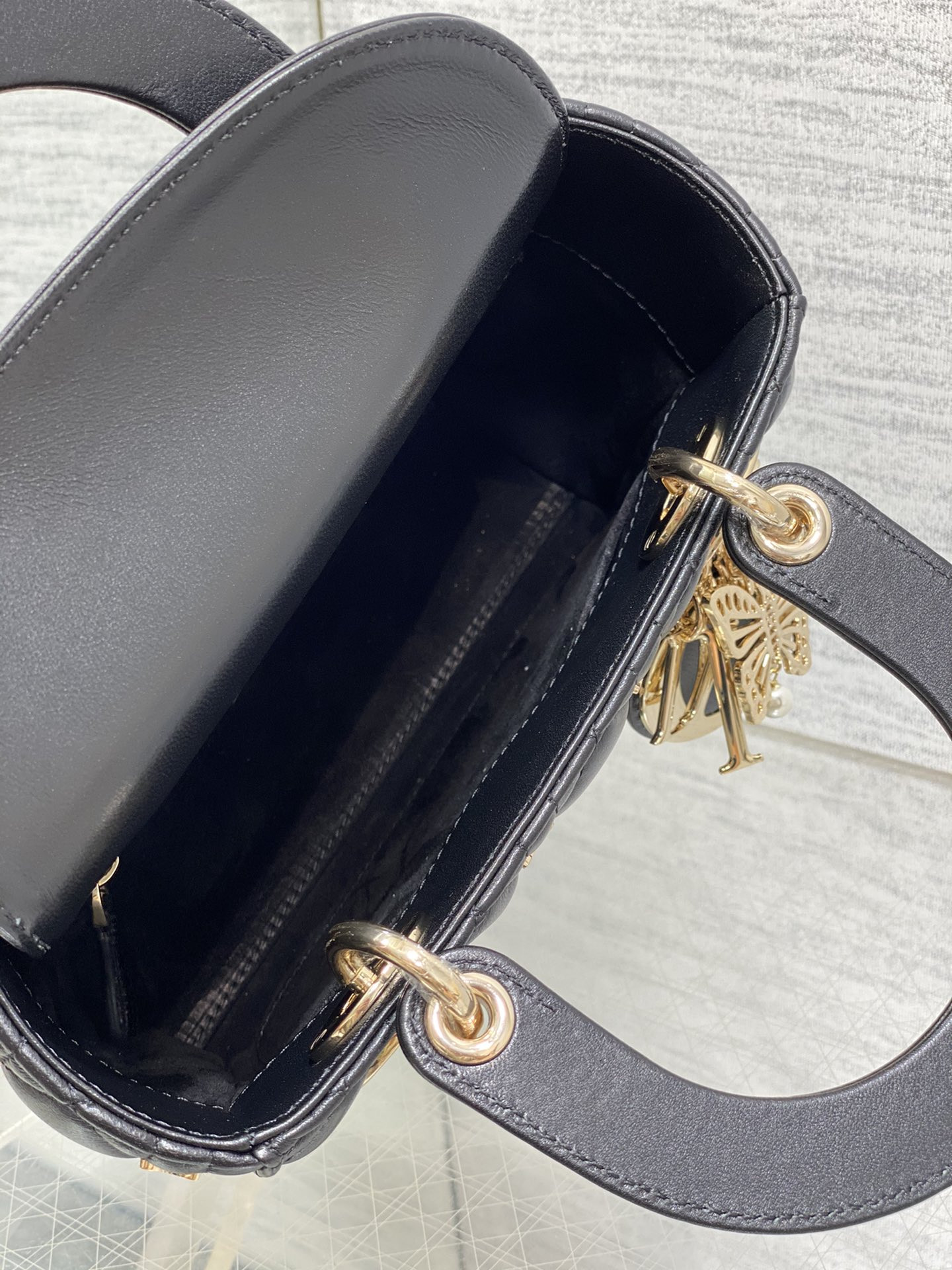 SMALL LADY DIOR Black with Butterfly Studs