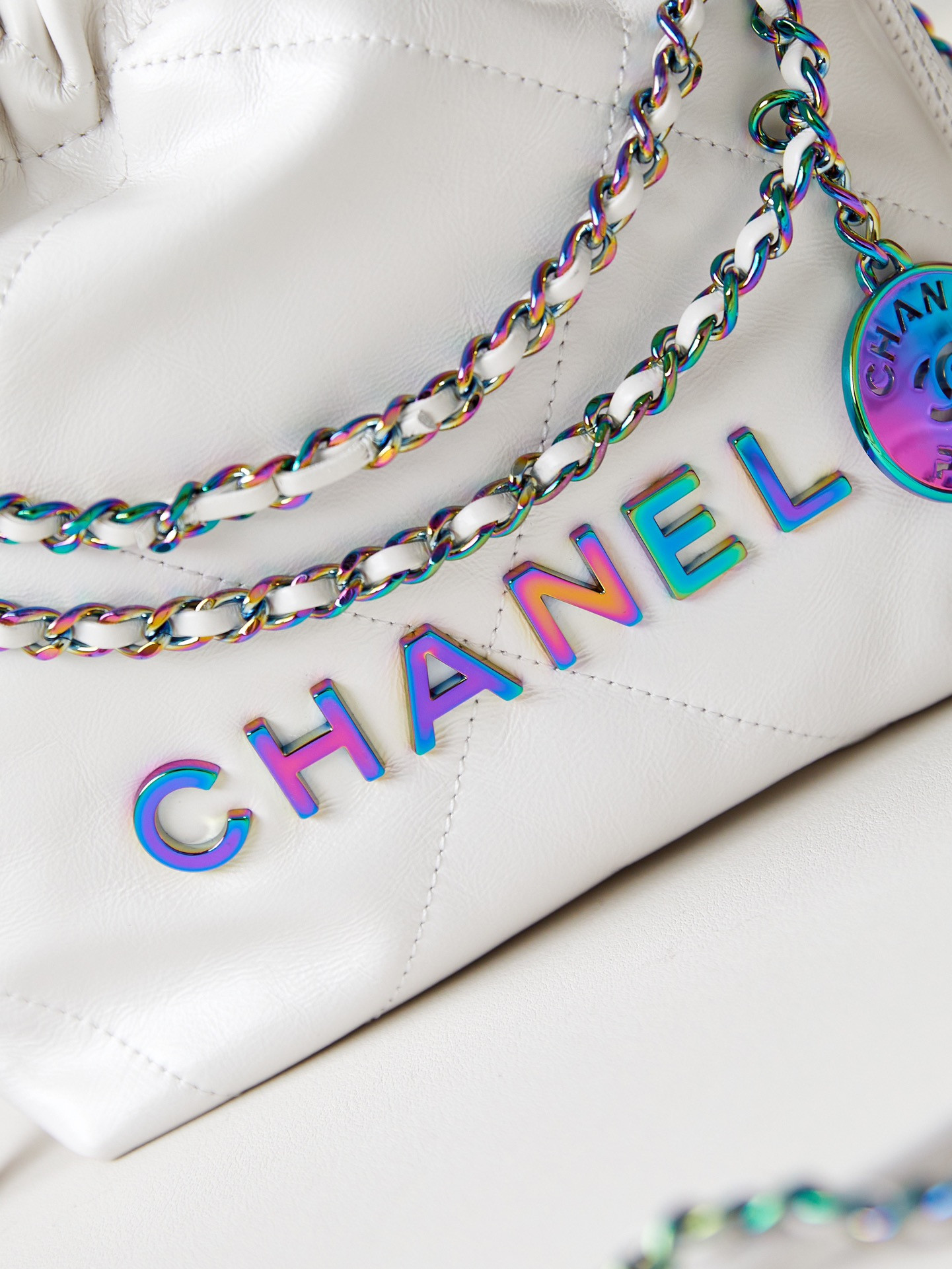 CHANEL 22 MINI HANDBAG Shiny Calfskin & Rainbow Metal White 7.8 × 7.4 × 2.3 in