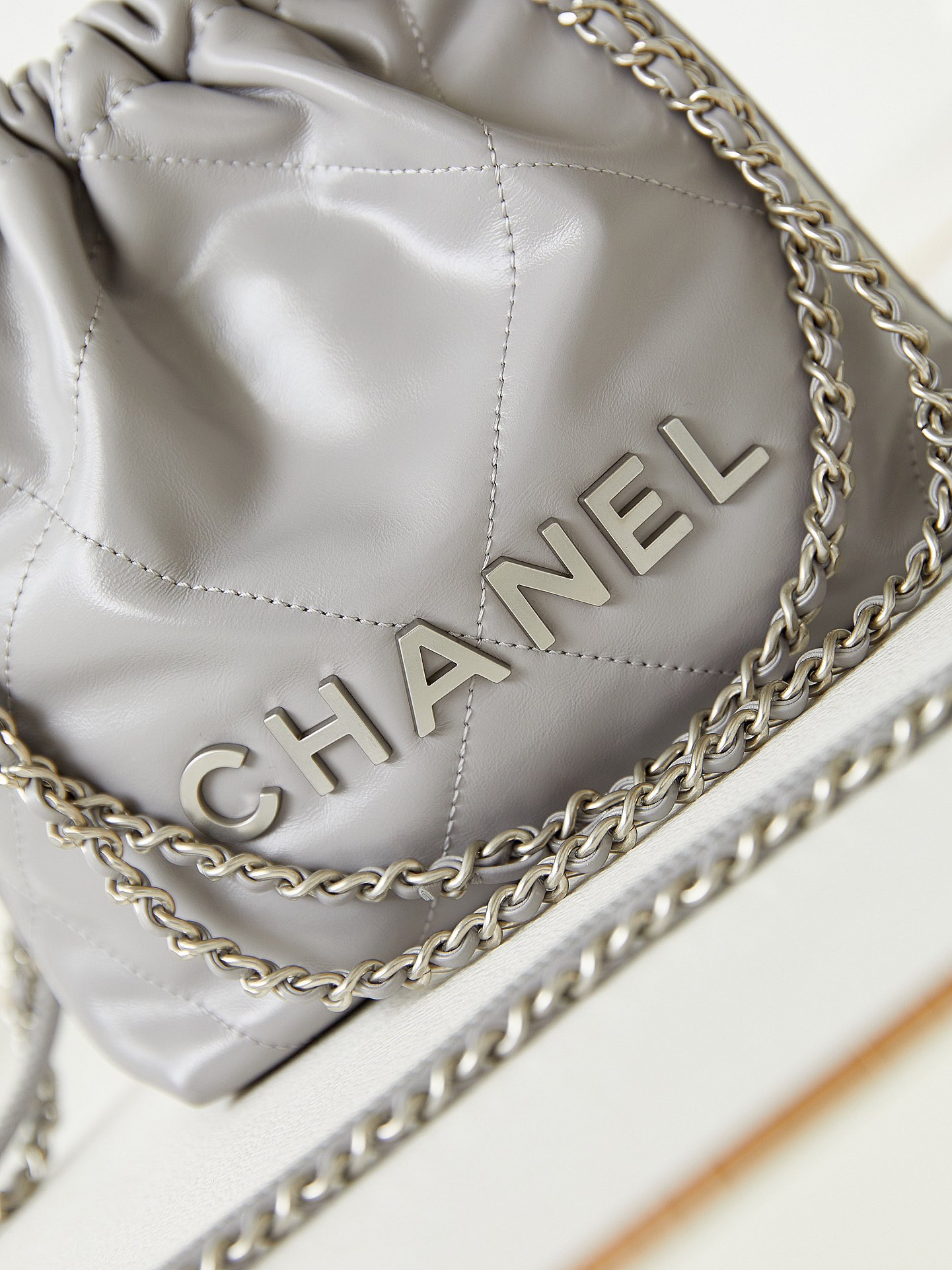 CHANEL 22 MINI HANDBAG Shiny Calfskin GREY 7.8 × 7.4 × 2.3 in