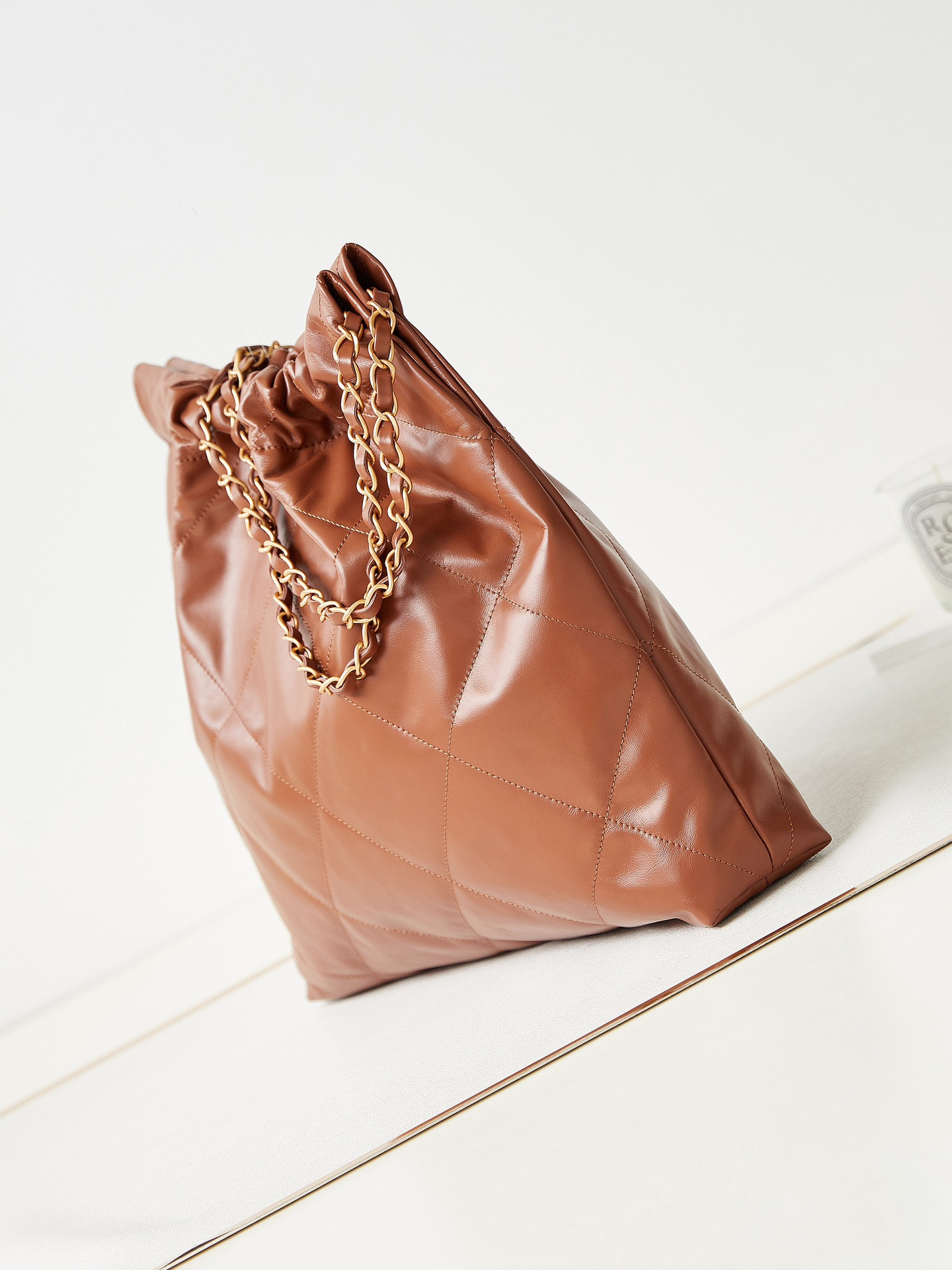 CHANEL 22 SMALL HANDBAG Shiny Calfskin BROWN 13.7×14.4×2.7 in