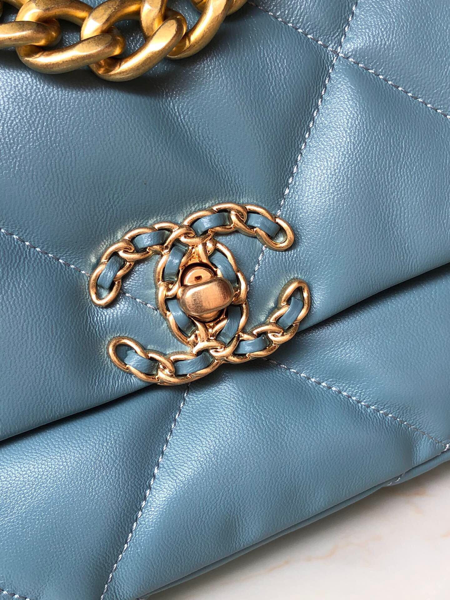 CHANEL 19 HANDBAG Shiny Leather, Gold-Tone, Silver-Tone & Ruthenium-Finish Metal Blue 6.2 × 10.1 × 3.5 in