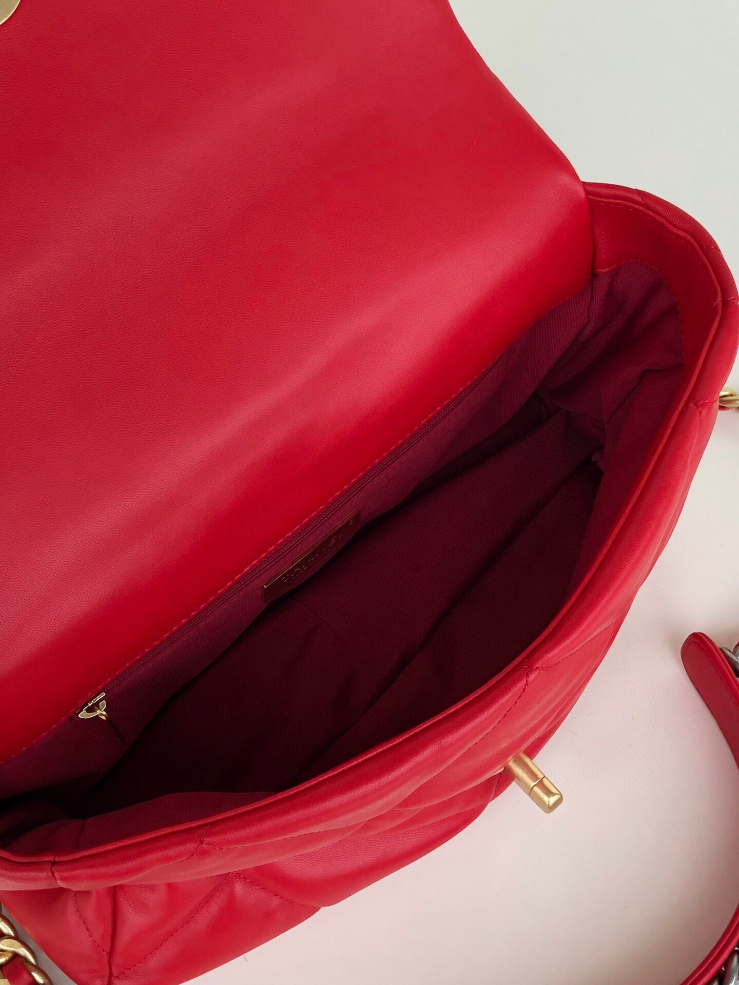 CHANEL 19 LARGE HANDBAG Shiny Leather, Gold-Tone, Silver-Tone & Ruthenium-Finish Metal Red 7.8 × 11.7 × 3.9 in