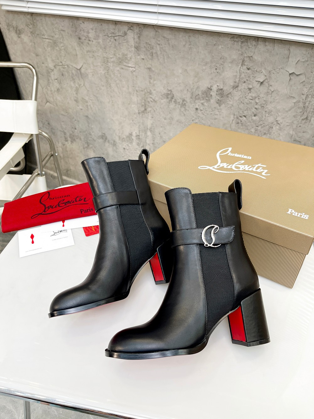 UA Christian Louboutin (CL) launched a new collection of chunky heeled platform boots