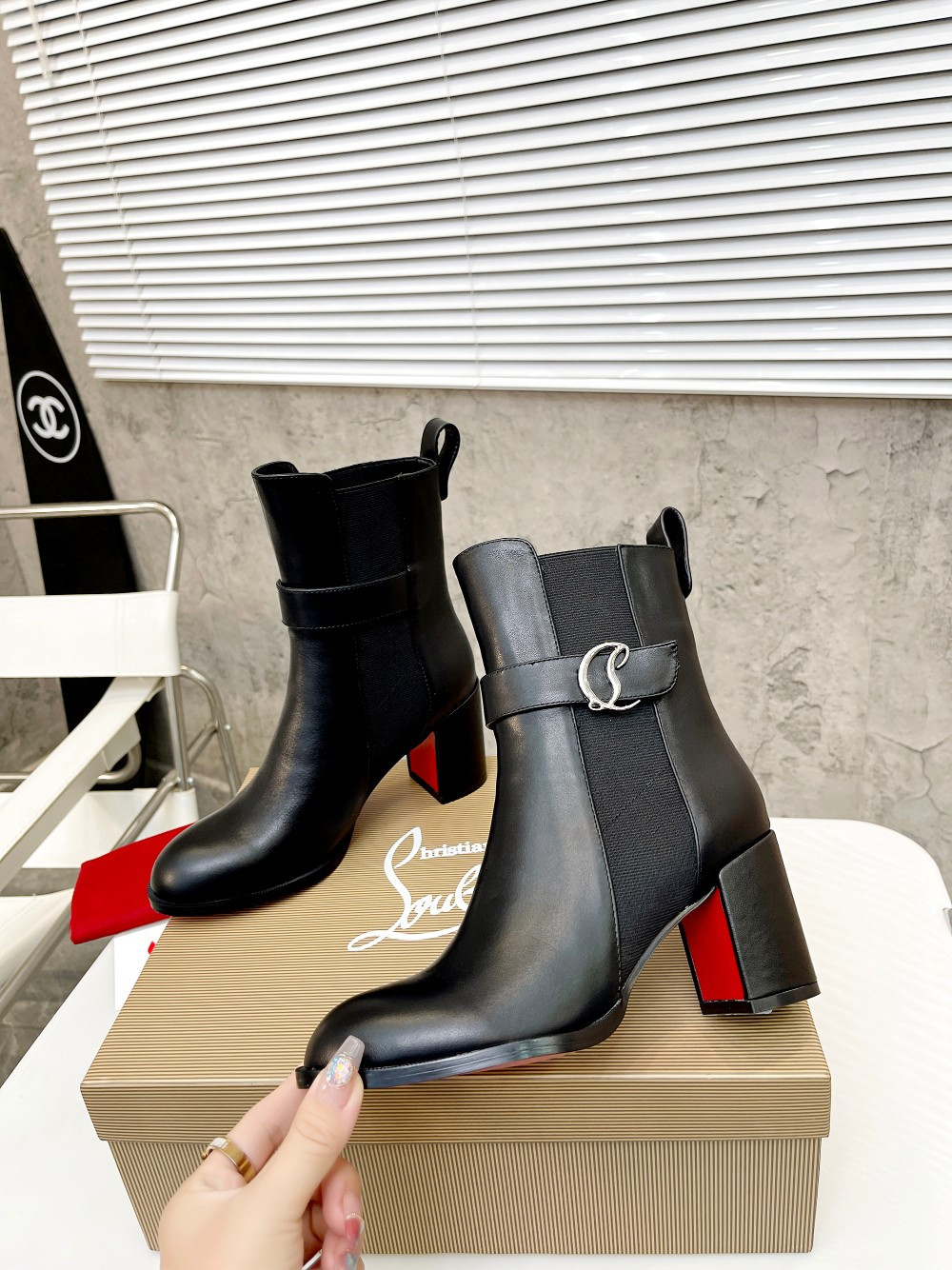 UA Christian Louboutin (CL) launched a new collection of chunky heeled platform boots