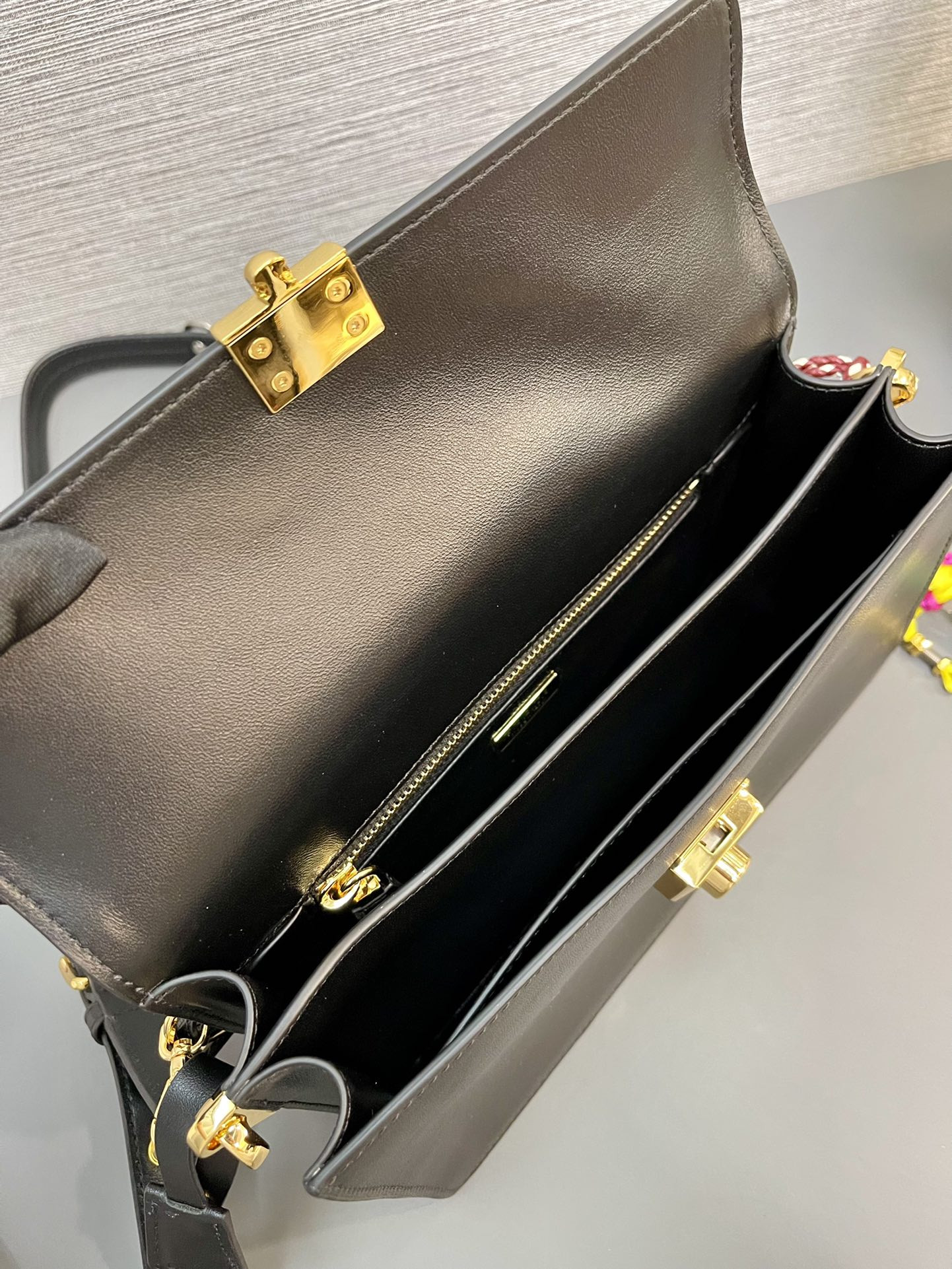 Prada Soft Sound small leather shoulder bag with charm 13.5x24x6cm