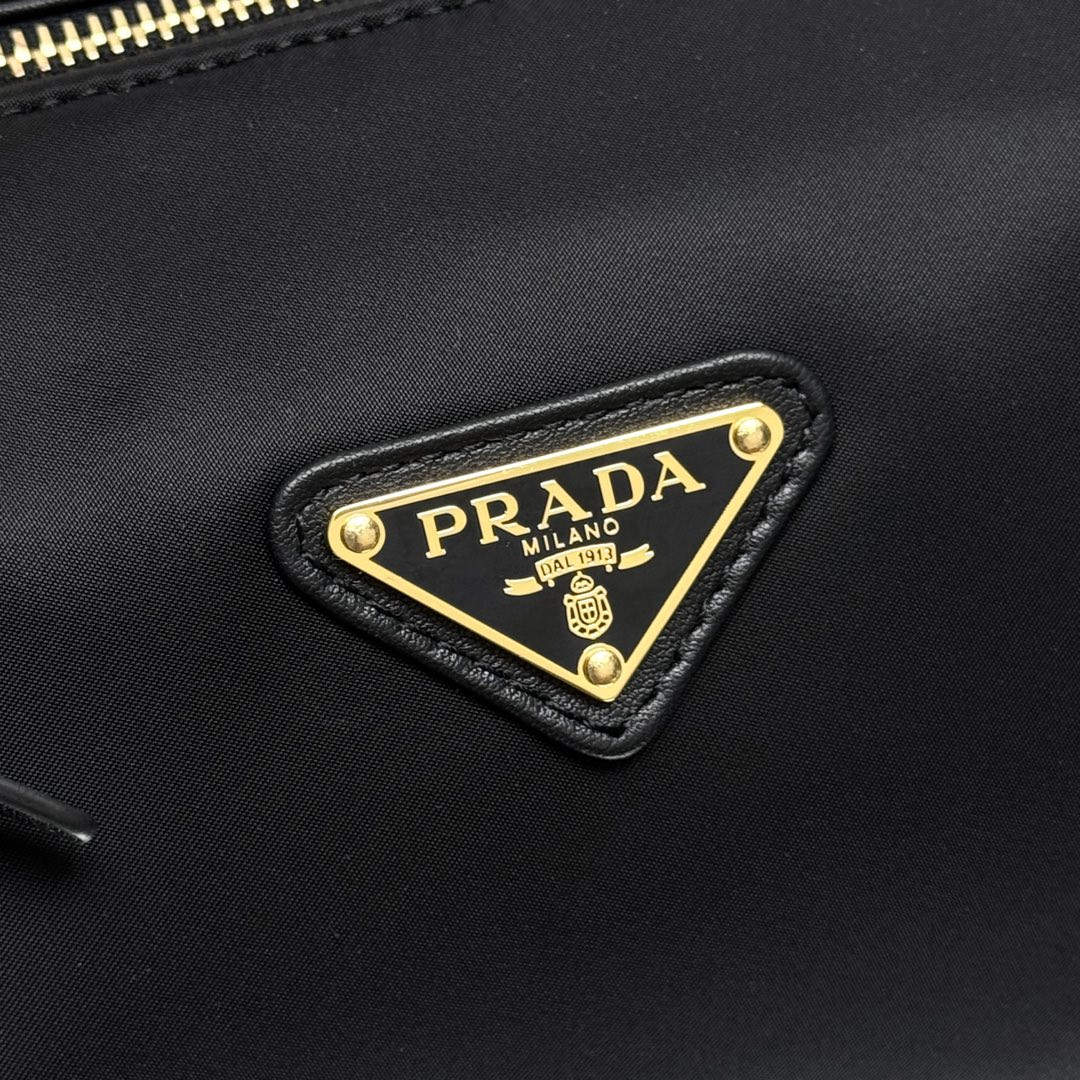 Prada Re-Nylon and leather medium top-handle bag with padlock 12.5x29x10cm